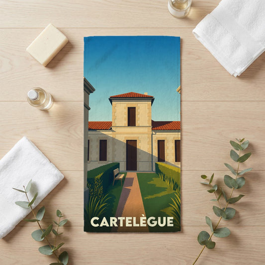 Serviette de bain souvenir de la ville de Cartelègue avec une illustration stylisée d'un bâtiment historique.