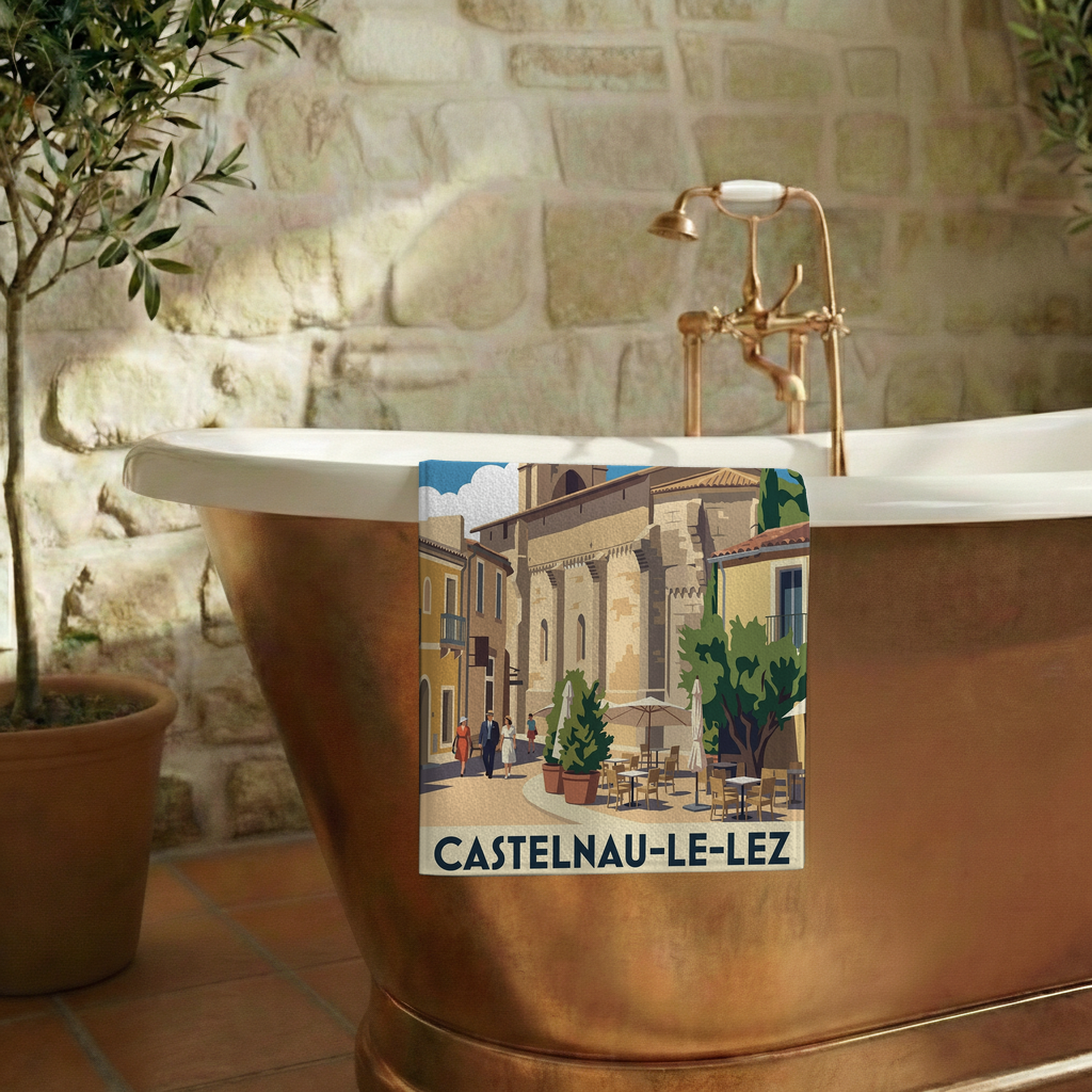 Serviette de bain souvenir de Castelnau-le-Lez avec une illustration stylisée de la ville.