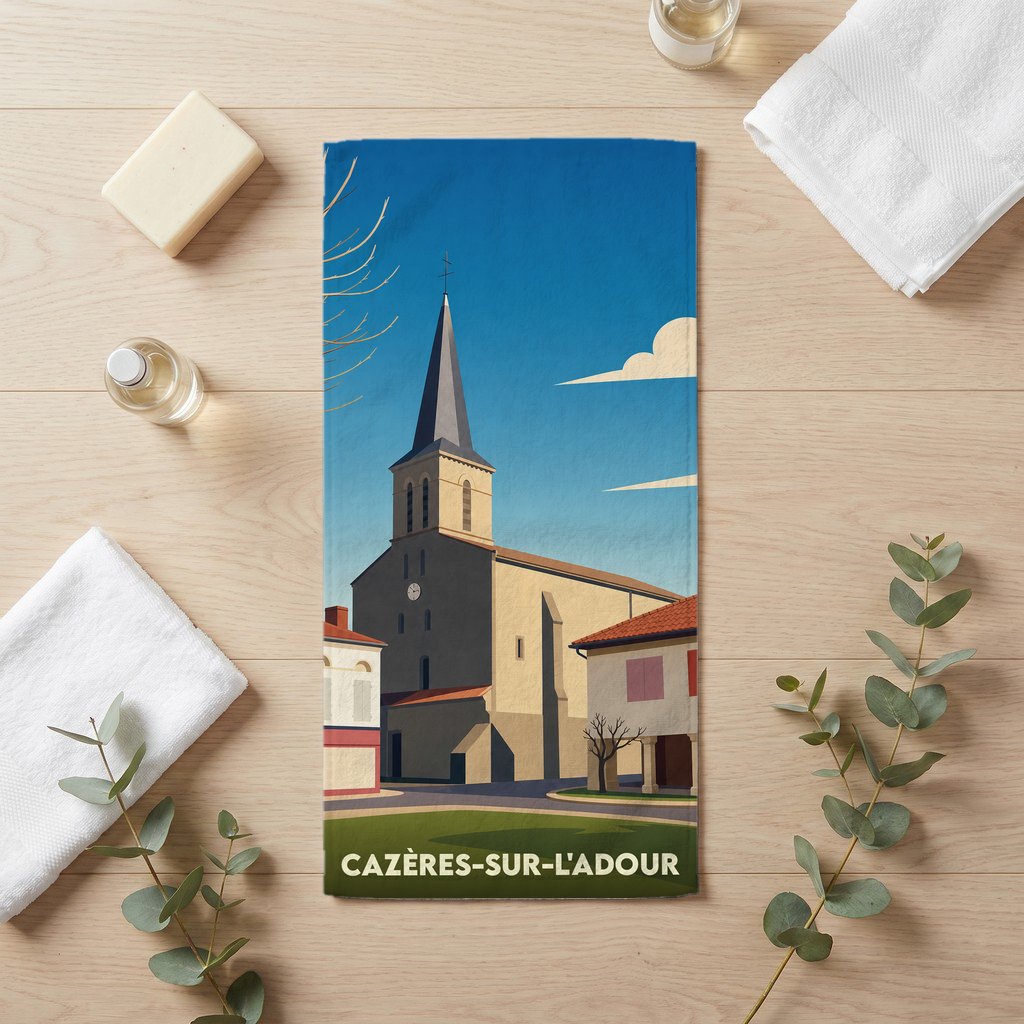 Serviette de bain souvenir de la ville de Cazères-sur-l'Adour avec une illustration stylisée de son église.