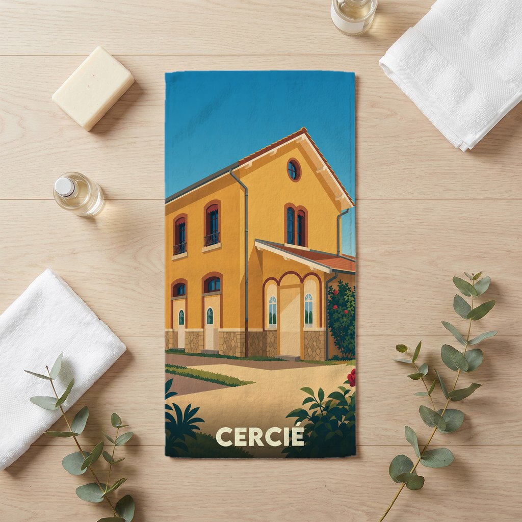 Serviette de bain souvenir de la ville de Cercié avec une illustration stylisée de son ancienne gare.