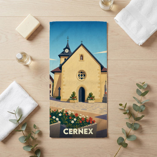 Serviette de bain souvenir de la ville de Cernex avec une illustration stylisée de son église.