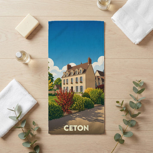Serviette de bain souvenir de la ville de Ceton avec une illustration stylisée.