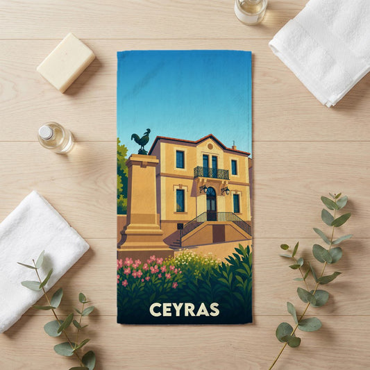Serviette de bain souvenir de la ville de Ceyras avec une illustration stylisée.