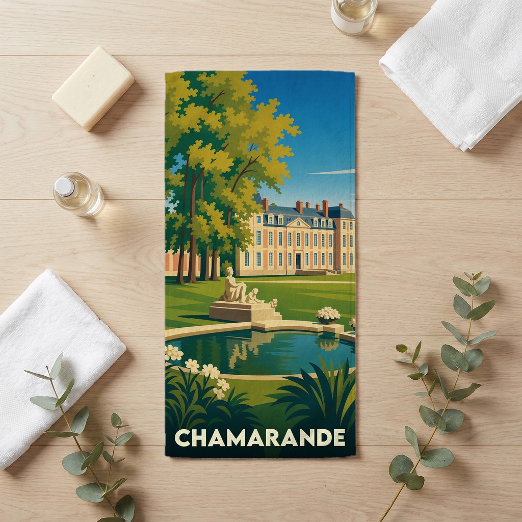 Serviette de bain souvenir de la ville de Chamarande avec une illustration stylisée de son château et de son parc.