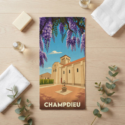 Serviette de bain souvenir de la ville de Champdieu avec une illustration stylisée.