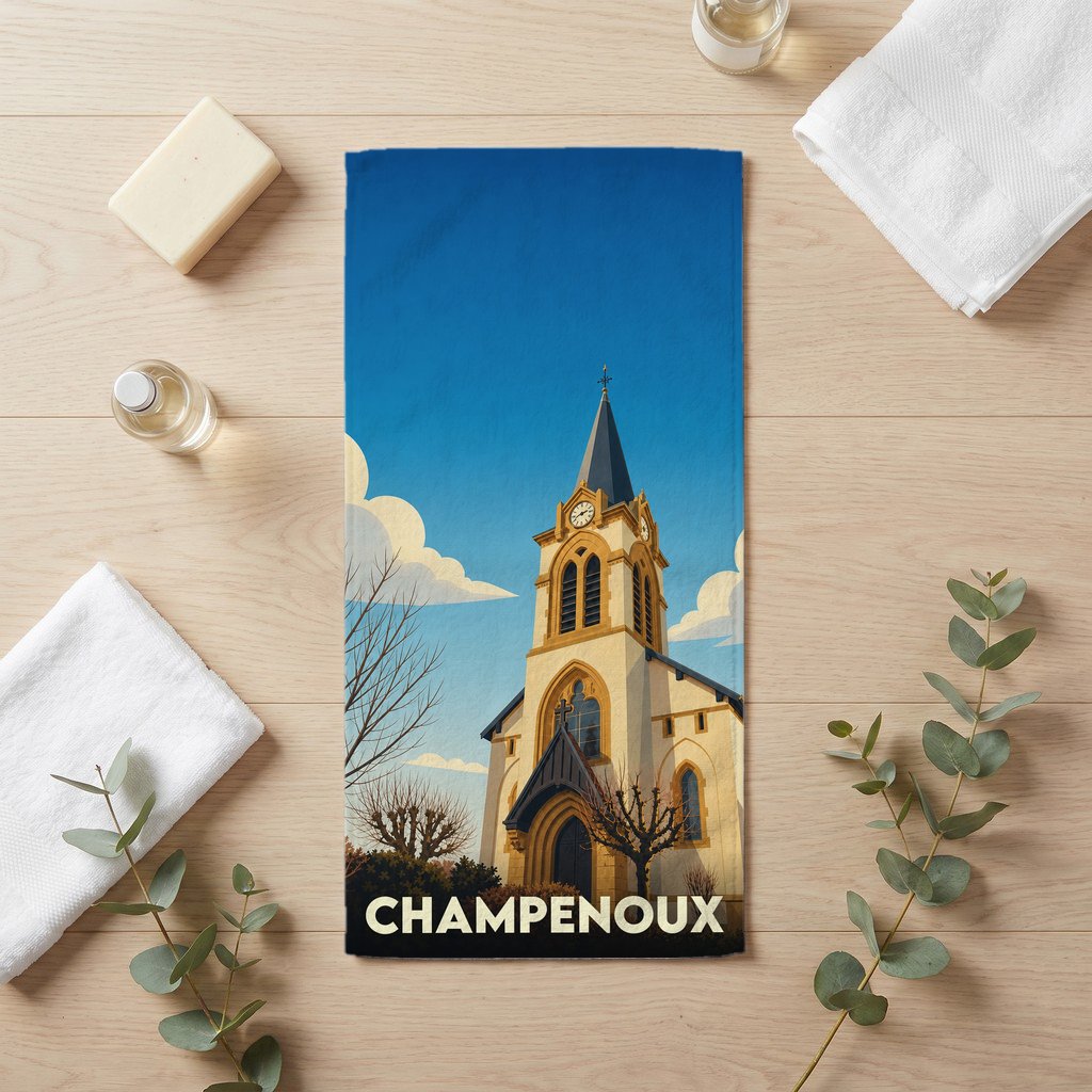 Serviette de bain souvenir de la ville de Champenoux avec une illustration stylisée d'une église sous un ciel bleu.