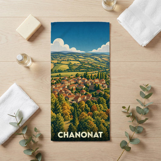 Serviette de bain souvenir de la ville de Chanonat avec une illustration de paysage champêtre.