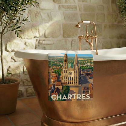 Serviette de bain souvenir de la ville de Chartres avec une illustration stylisée.