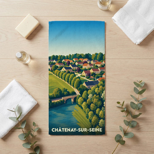 Serviette de bain souvenir de Châtenay-sur-Seine ornée d'une illustration paysagère stylisée.