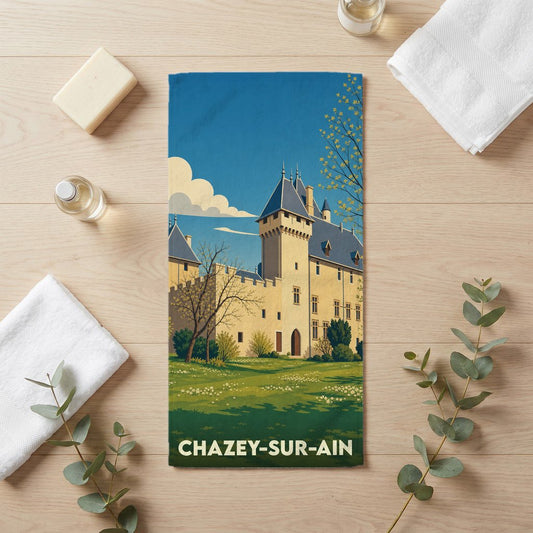 Serviette de bain souvenir de Chazey-sur-Ain avec une illustration stylisée de son château.