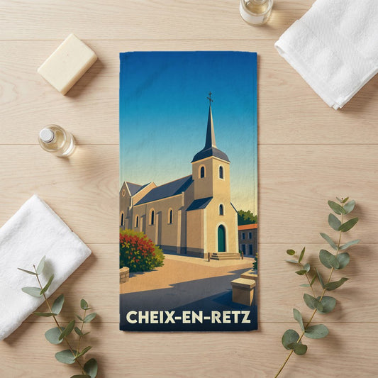 Serviette de bain souvenir de la ville de Cheix-en-Retz avec une illustration stylisée de son église.