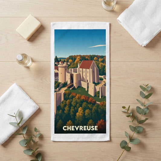 Serviette de bain souvenir de la ville de Chevreuse avec une illustration stylisée de son château.