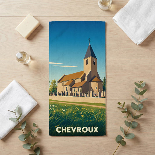 Serviette de bain souvenir de la ville de Chevroux illustrée d'une église de style vintage.