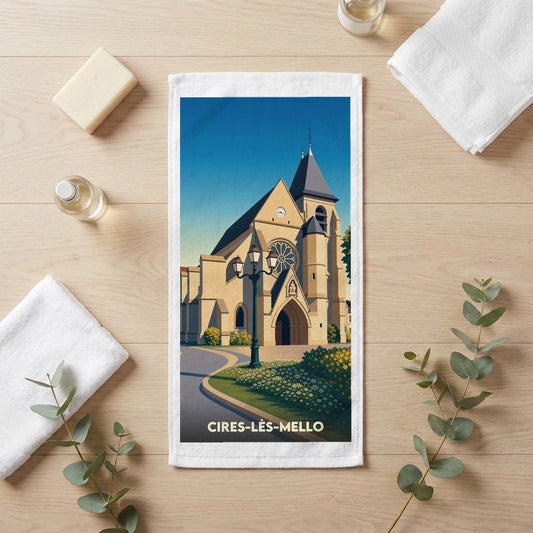 Serviette de bain souvenir de la ville de Cires-lès-Mello avec une illustration stylisée de son église.