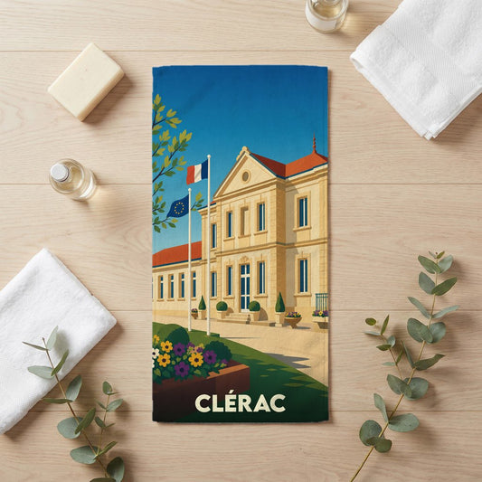 Serviette de bain souvenir de la ville de Clérac avec une illustration stylisée de sa mairie.