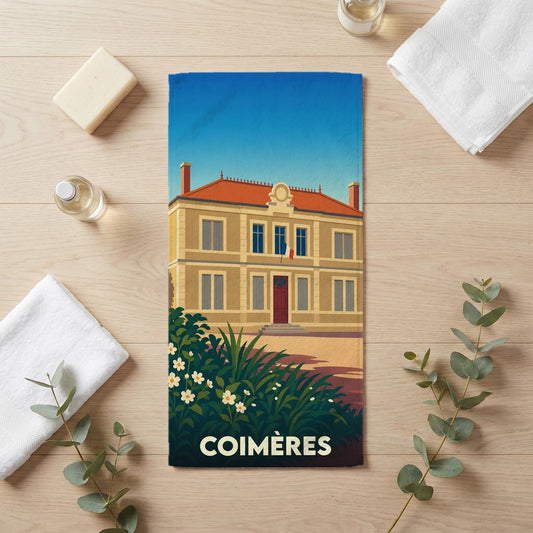 Serviette de bain souvenir de la ville de Coimères avec une illustration stylisée de sa mairie.