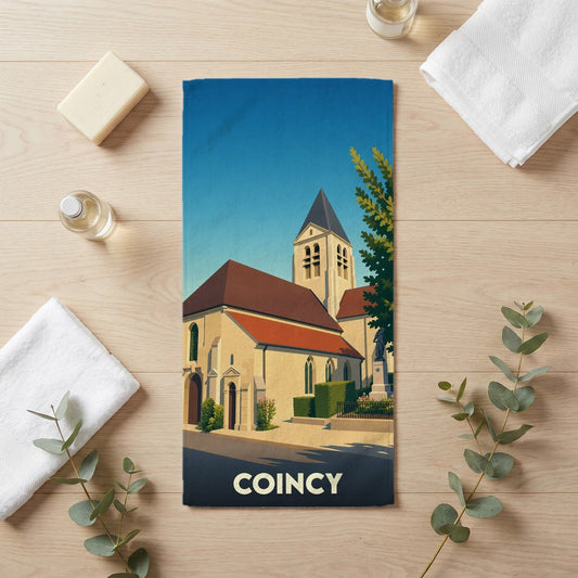 Serviette de bain souvenir de la ville de Coincy illustrant son église dans un style graphique épuré.
