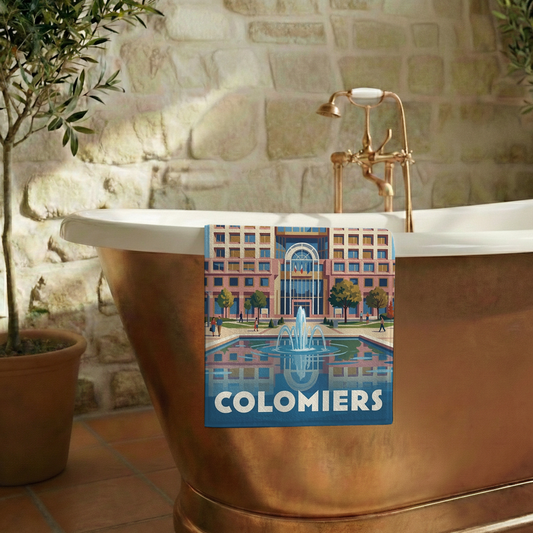 Serviette de bain souvenir de la ville de Colomiers avec une illustration stylisée.