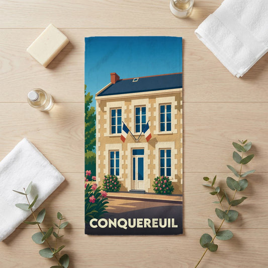 Serviette de bain souvenir de la ville de Conquereuil avec une illustration stylisée.