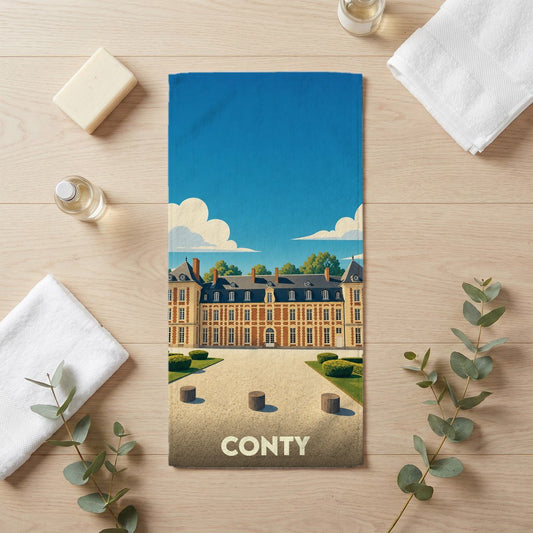 Serviette de bain souvenir de la ville de Conty avec une illustration stylisée d'un château.