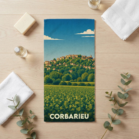 Serviette de bain souvenir de la ville de Corbarieu avec une illustration de paysage stylisée.