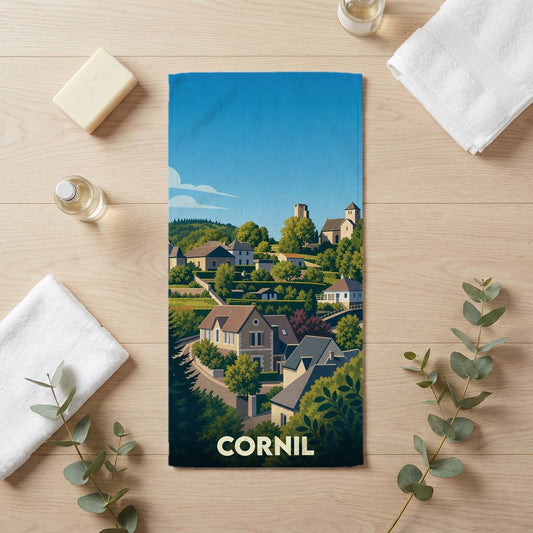Serviette de bain souvenir de la ville de Cornil avec une illustration stylisée.
