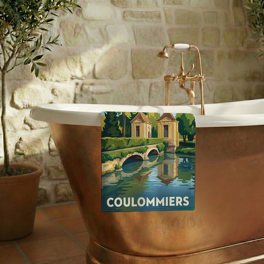 Serviette de bain souvenir de la ville de Coulommiers avec une illustration stylisée.