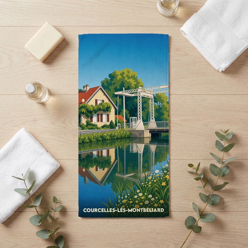 Serviette de bain souvenir de Courcelles-lès-Montbéliard avec une illustration stylisée d'un canal et de son pont levant.