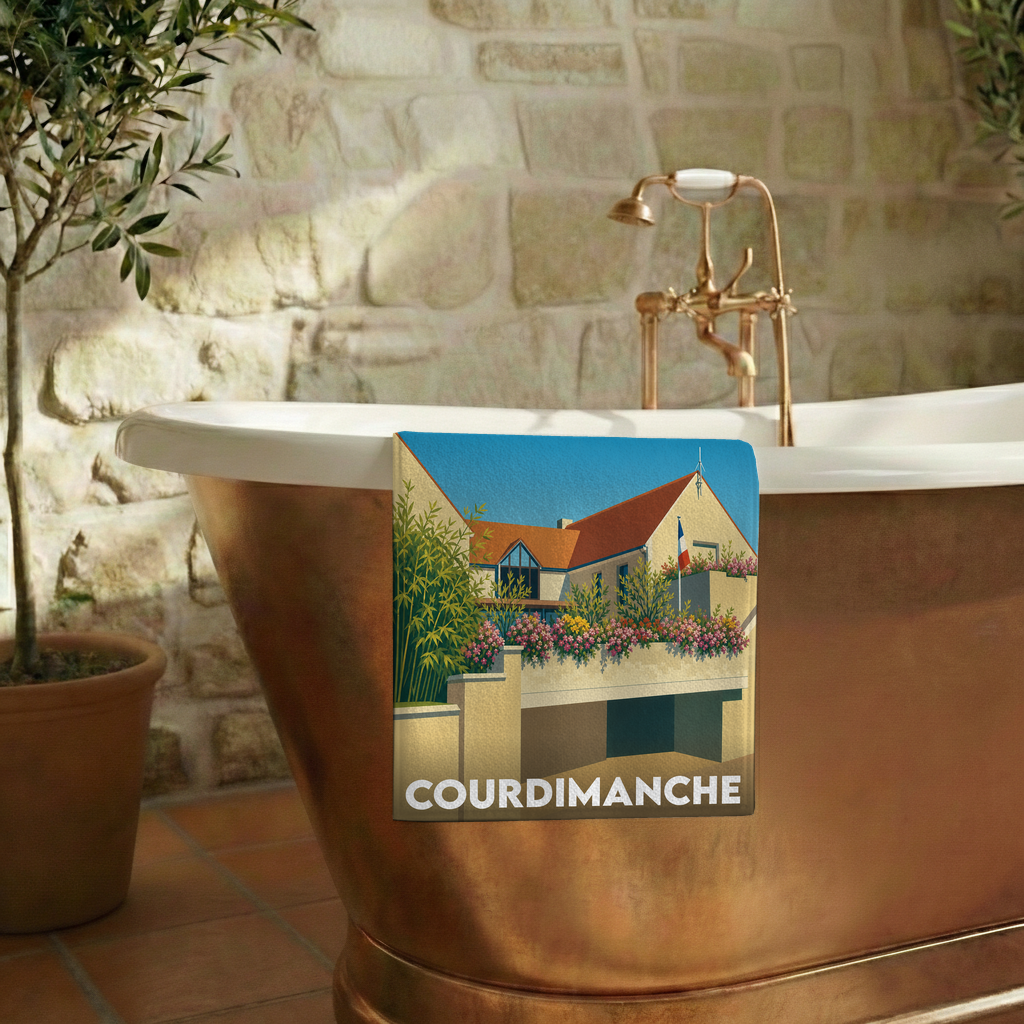 Serviette de bain souvenir de la ville de Courdimanche avec une illustration stylisée d'une maison fleurie.