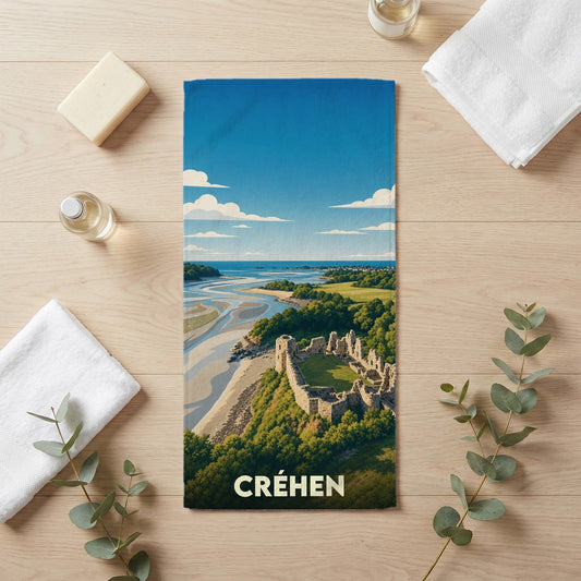 Serviette de bain souvenir de la ville de Créhen avec une illustration stylisée d'un château en bord de mer.