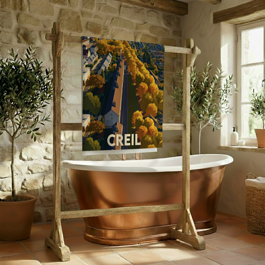 Serviette de bain souvenir de la ville de Creil avec une illustration stylisée.