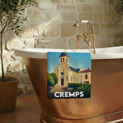 Serviette de bain souvenir de la ville de Cremps avec une illustration stylisée.