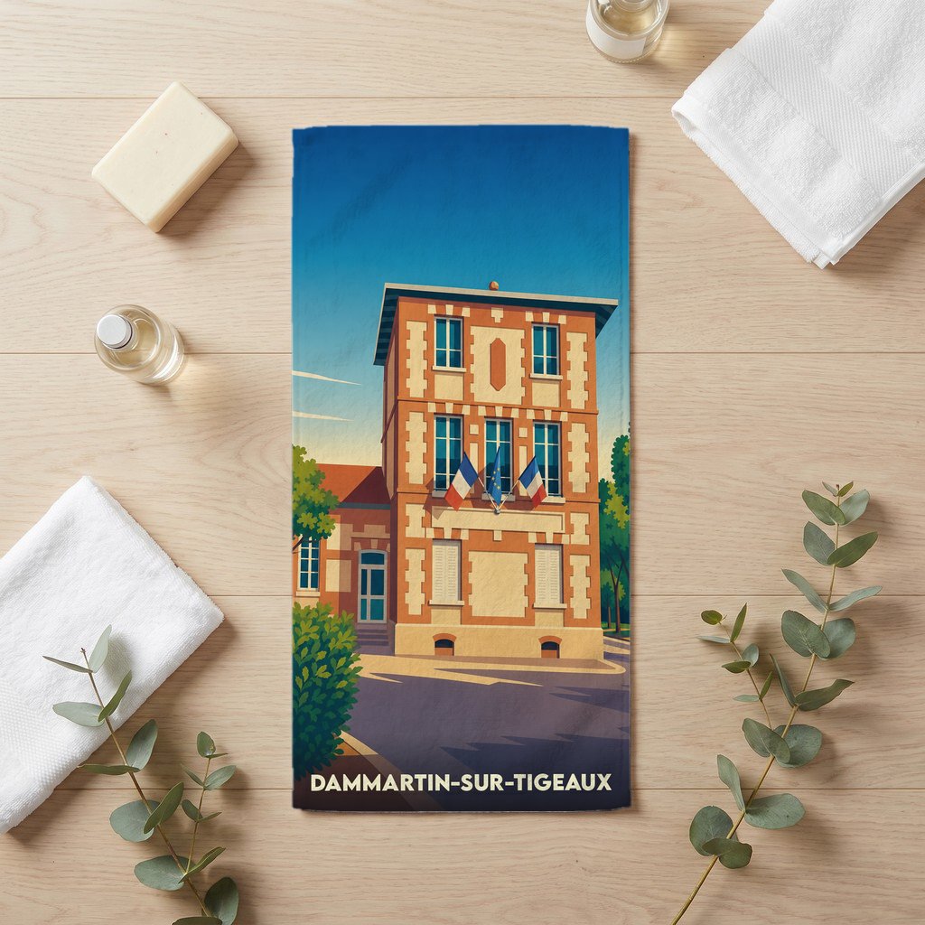 Serviette de bain souvenir de la ville de Dammartin-sur-Tigeaux avec une illustration stylisée de sa mairie.