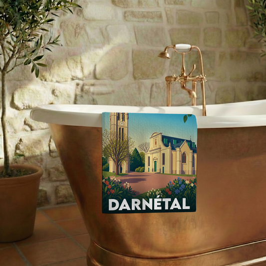 Serviette de bain souvenir de la ville de Darnétal avec une illustration stylisée d'une église.