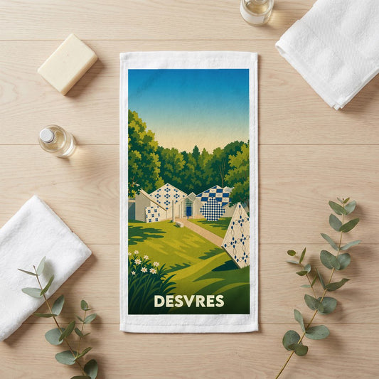 Serviette de bain souvenir de la ville de Desvres avec une illustration stylisée.