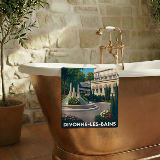 Serviette de bain souvenir de la ville de Divonne-les-Bains avec une illustration stylisée.