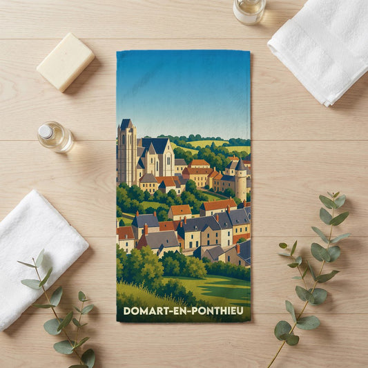Serviette de bain souvenir de Domart-en-Ponthieu ornée d'une illustration stylisée du village et de son église.
