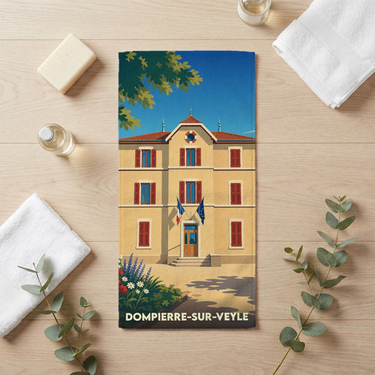 Serviette de bain souvenir de la ville de Dompierre-sur-Veyle avec une illustration stylisée de sa mairie.