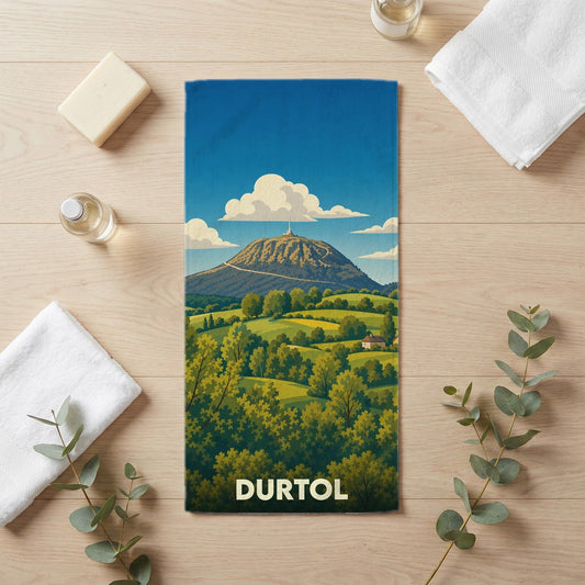 Serviette de bain souvenir de la ville de Durtol avec une illustration stylisée du Puy de Dôme.
