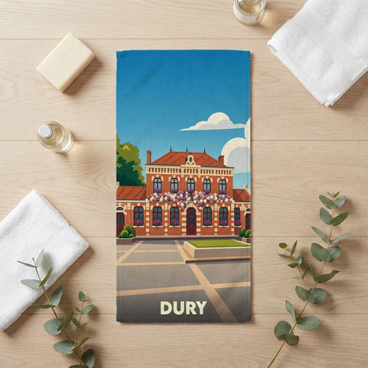 Serviette de bain souvenir de la ville de Dury avec une illustration stylisée de son hôtel de ville.