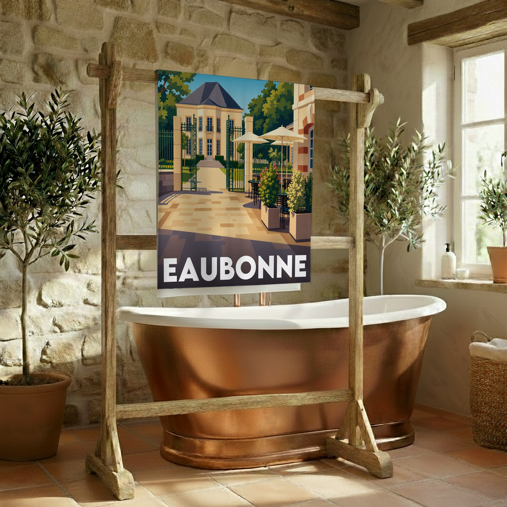 Serviette de bain souvenir de la ville d'Eaubonne avec une illustration stylisée d'un manoir et son jardin.