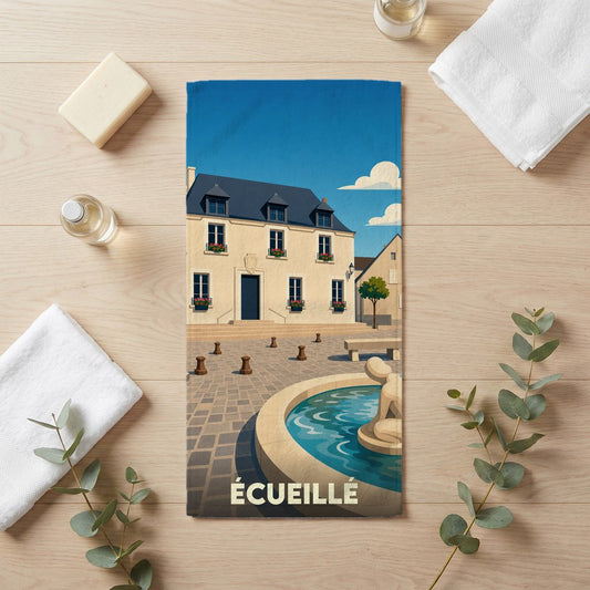 Serviette de bain souvenir de la ville de Écueillé avec une illustration stylisée.
