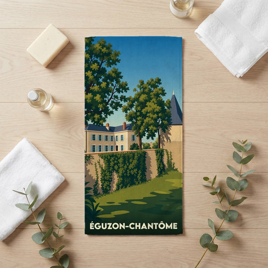 Serviette de bain souvenir de la ville d'Éguzon-Chantôme avec une illustration stylisée.