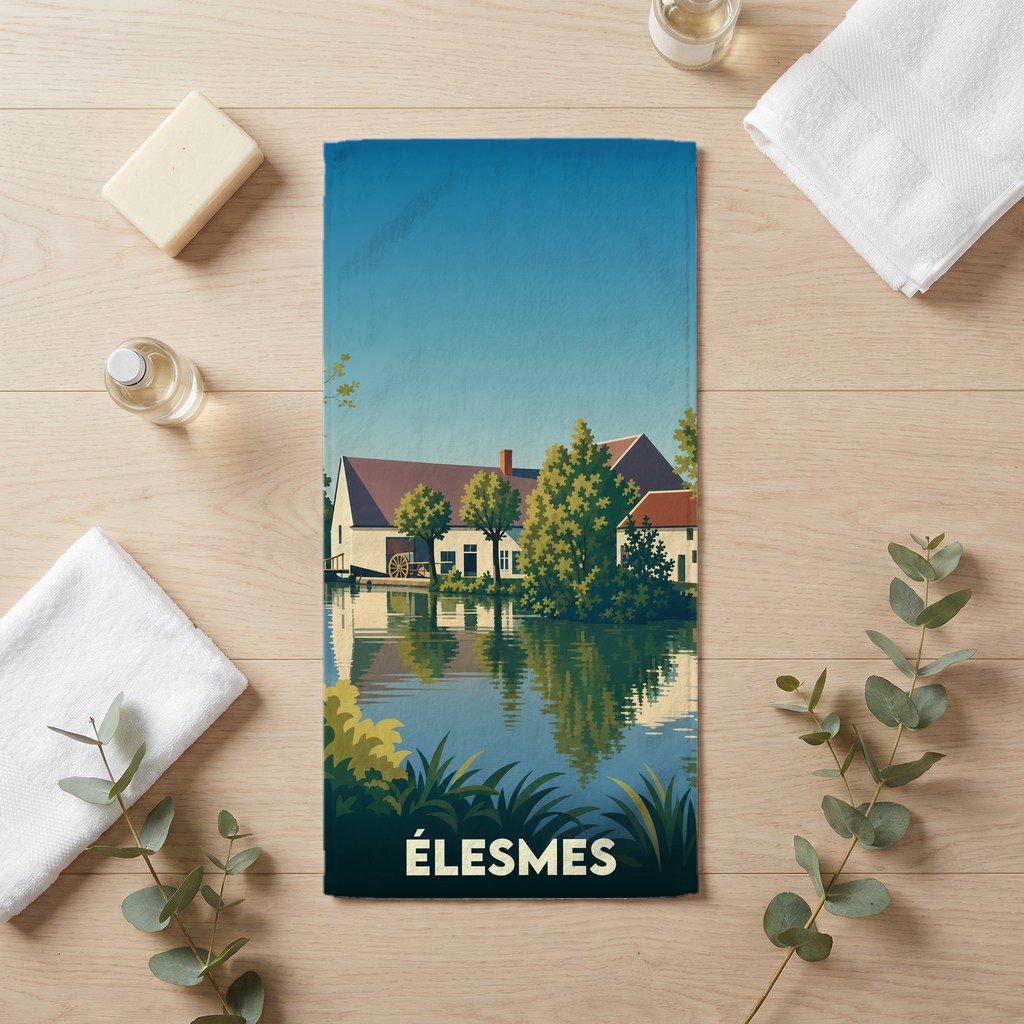 Serviette de bain souvenir de la ville d'Élesmes avec une illustration stylisée d'un paysage au bord de l'eau.
