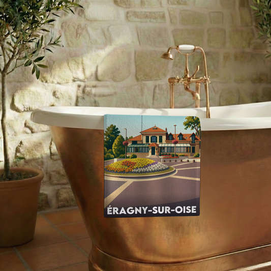 Serviette de bain souvenir de la ville d'Éragny-sur-Oise avec une illustration stylisée.