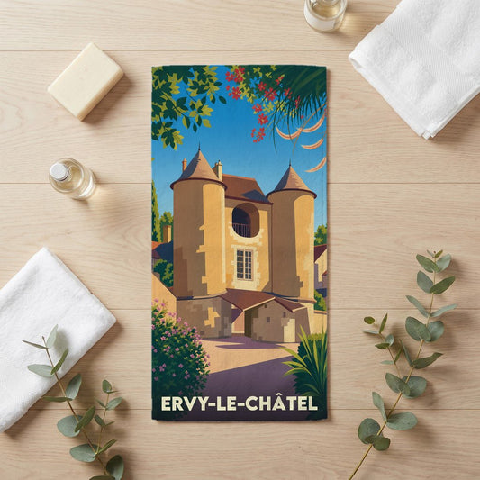 Serviette de bain souvenir de la ville d'Ervy-le-Châtel avec une illustration stylisée de sa porte médiévale.