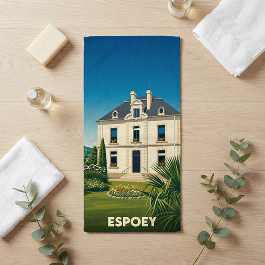 Serviette de bain souvenir de la ville de Espoey avec une illustration stylisée d'une demeure bourgeoise.