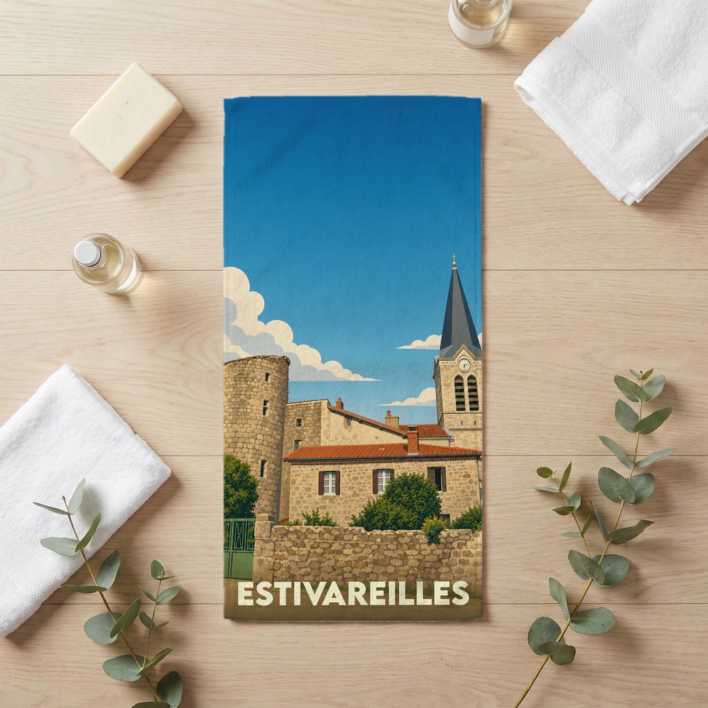 Serviette de bain souvenir de la ville d'Estivareilles avec une illustration stylisée de son église et de ses bâtiments en pierre.