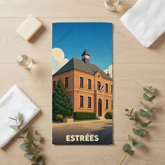 Serviette de bain souvenir de la ville de Estrées avec une illustration stylisée de sa mairie.