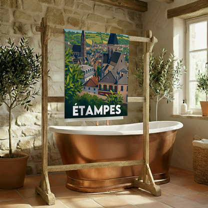 Serviette de bain souvenir de la ville de Étampes illustrée d'un paysage urbain stylisé.